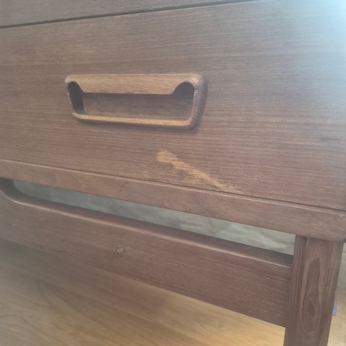 2028 - A Mid Century Danish teak veneered writing desk with writing slope, three exterior drawers and two i... 