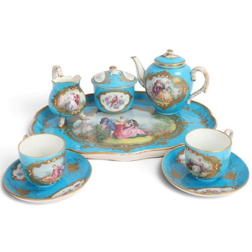 372 - A Sevres porcelain tea-for-two service on matching tray, with painted and gilded decoration, tray wi... 
