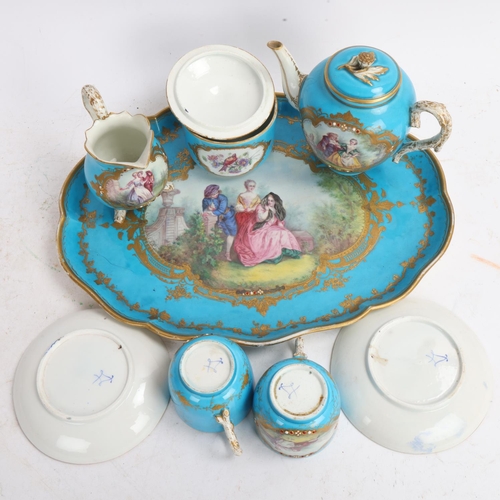 372 - A Sevres porcelain tea-for-two service on matching tray, with painted and gilded decoration, tray wi... 