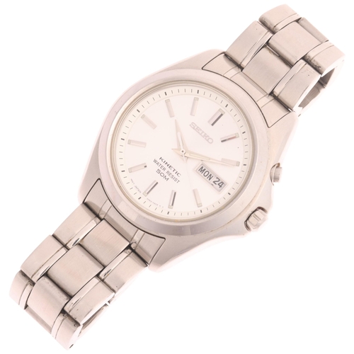 1015 - SEIKO - a stainless steel Kinetic automatic calendar bracelet watch, ref. 5M63-0B90, silvered dial w... 