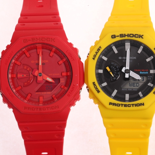 1038 - 3 Casio G-Shock quartz wristwatches, ref. GA-V2100, comprising yellow green and red, all working ord... 