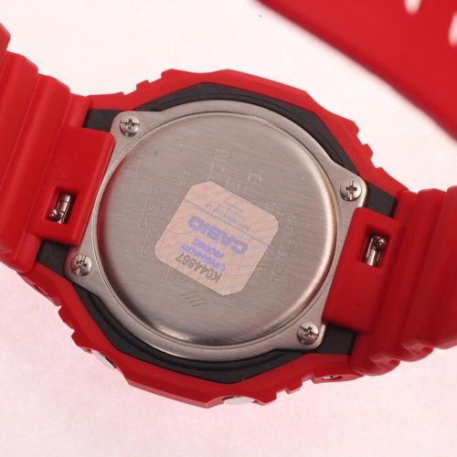 1038 - 3 Casio G-Shock quartz wristwatches, ref. GA-V2100, comprising yellow green and red, all working ord... 