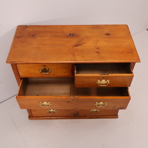 A Victorian pine chest of two short and three long drawers. W98cm ...
