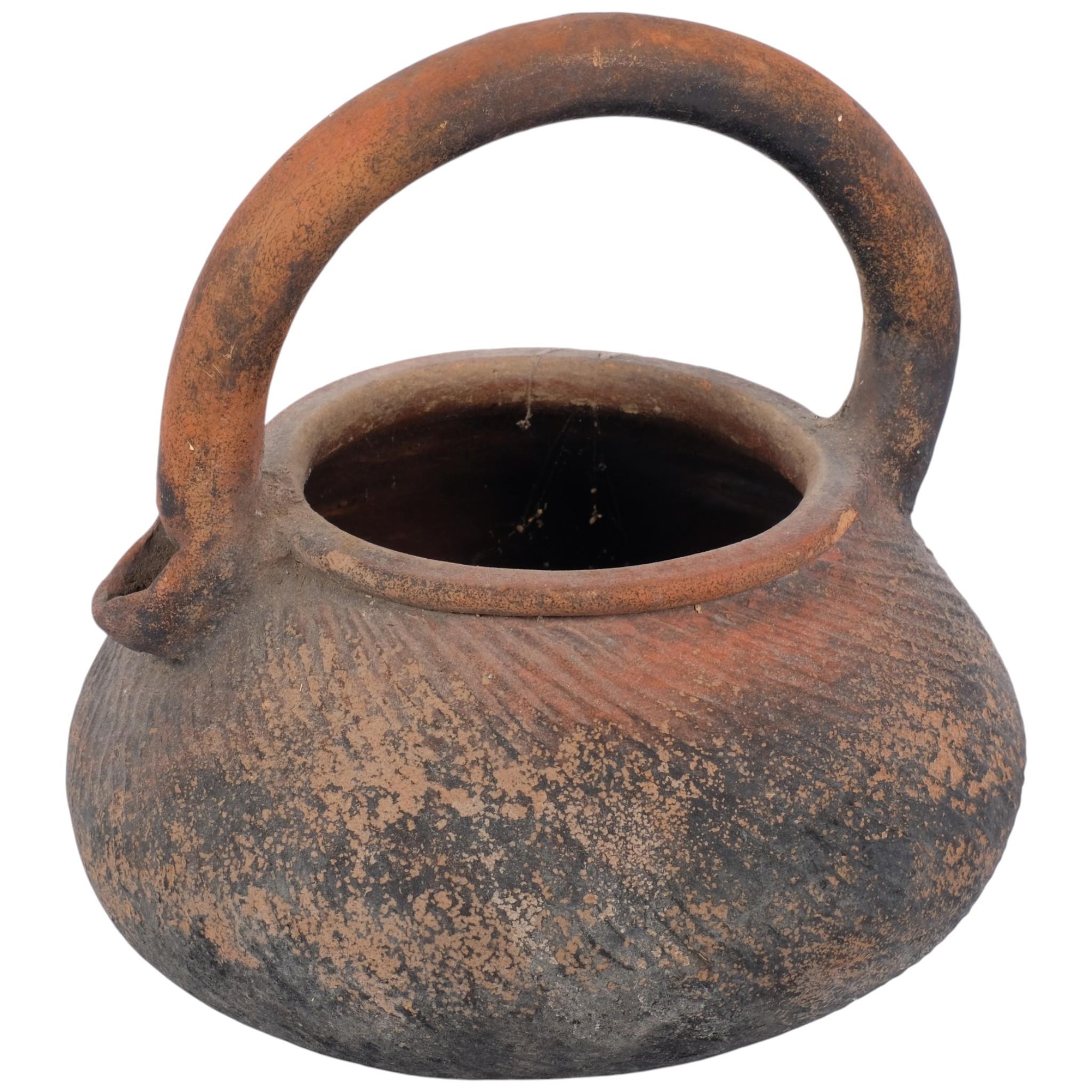 An early Chinese/Japanese unglazed terrcotta kettle, body with incised ...