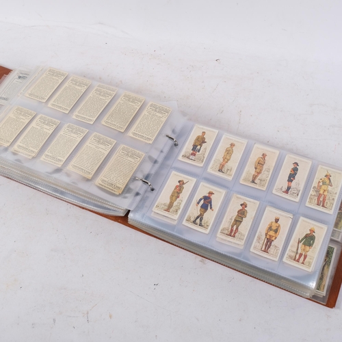 An album of cigarette cards, including complete sets, issued by John ...