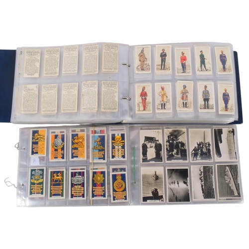 An album of cigarette cards, many complete sets, various issuers ...