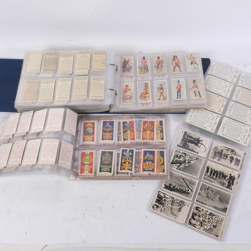 An album of cigarette cards, many complete sets, various issuers ...
