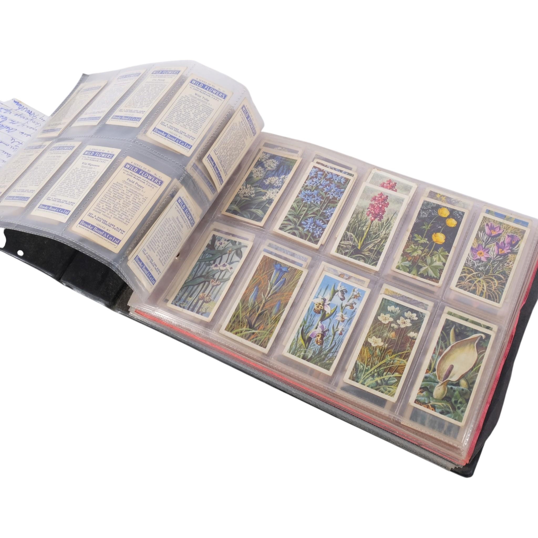 An album of cigarette cards, many complete sets, various issuers ...