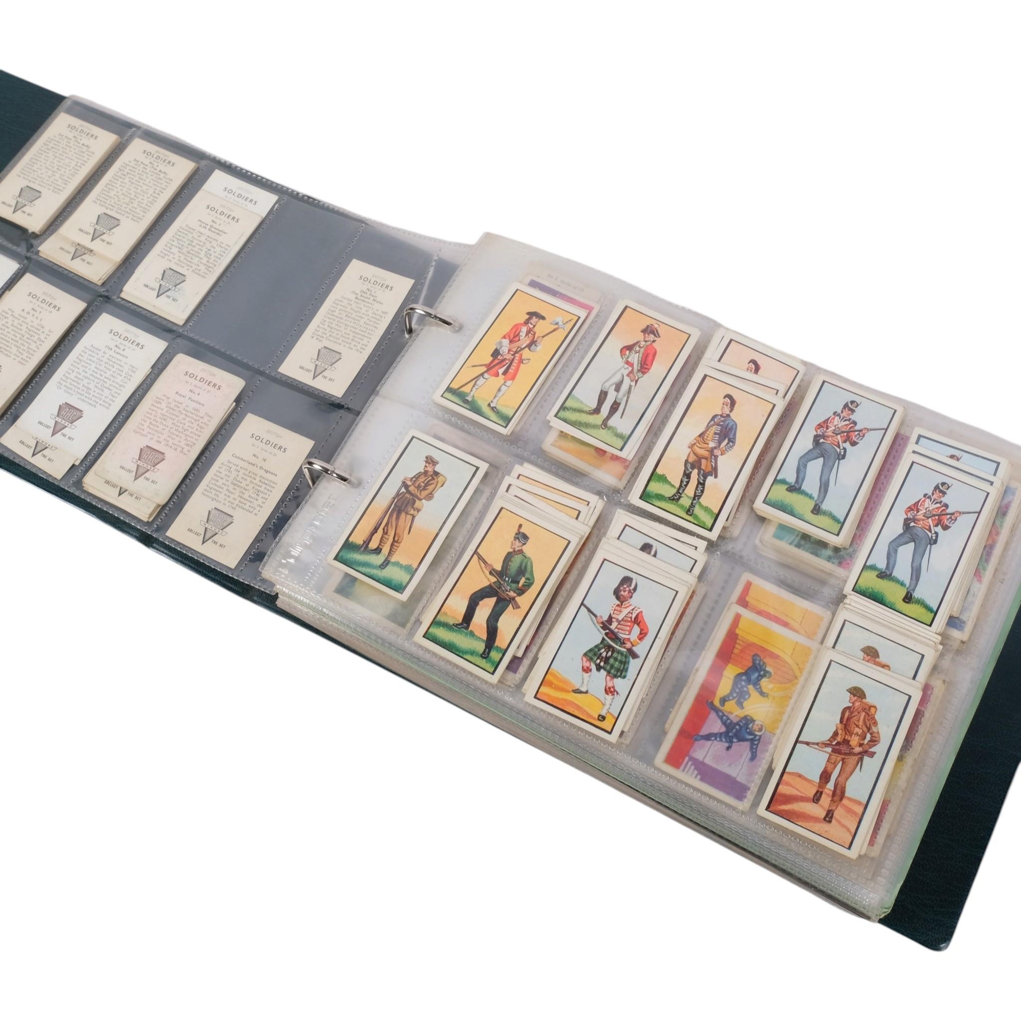 An album of cigarette cards, many complete sets, issuers including ...