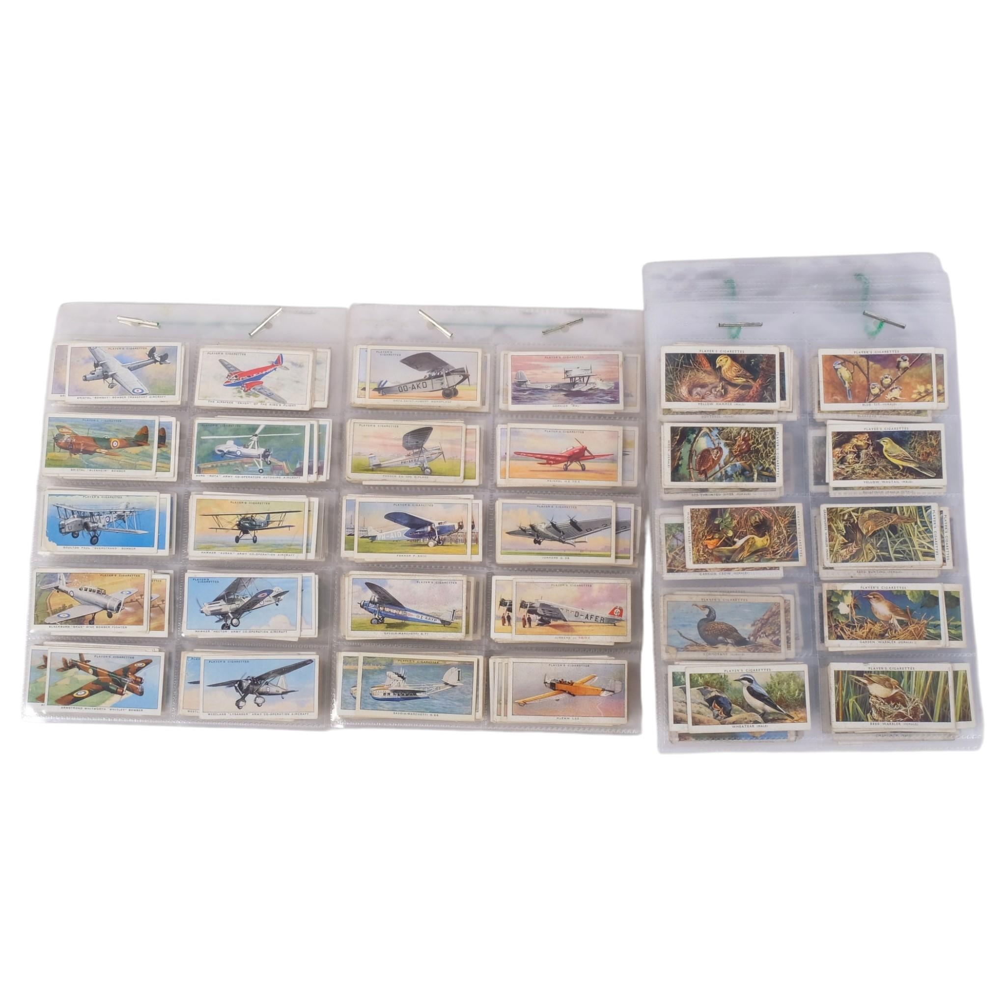An album of cigarette cards, many complete sets, these by John Player ...