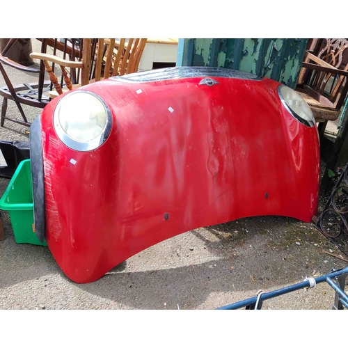 12 - A red Mini Cooper bonnet
