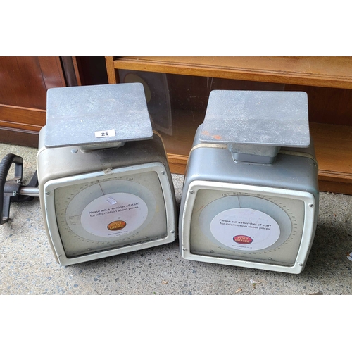 21 - Two sets of double sided post office scales