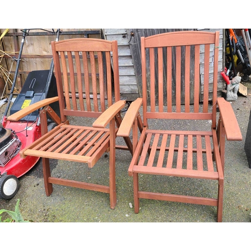 36 - Two folding slatted teak garden chairs