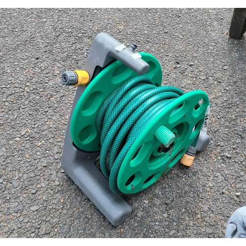 5 - A garden hose pipe on freestanding reel