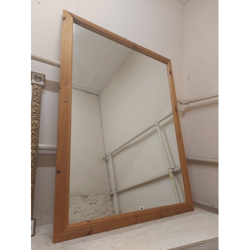 352 - A large modern pine oblong wall mirror
