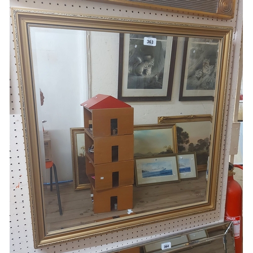 363 - A modern gilt framed bevelled oblong wall mirror - sold with a narrow oblong similar