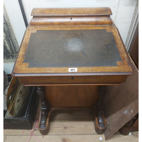 371 - A 54cm late Victorian figured walnut and strung Davenport with leather inset top, lift-up pen tray a... 