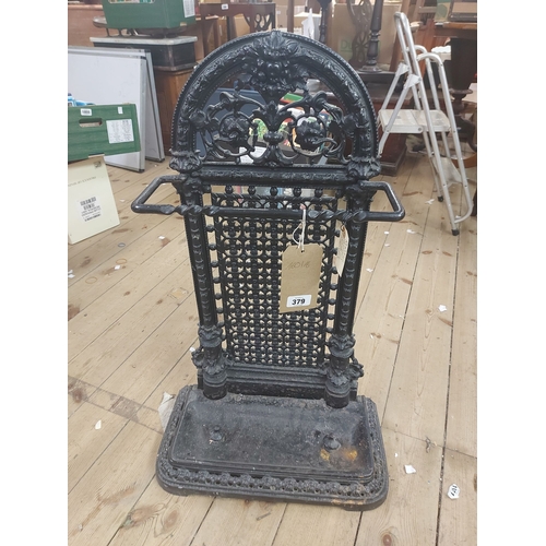 379 - A Victorian black painted cast iron stick stand with pierced decoration and drip tray - registration... 