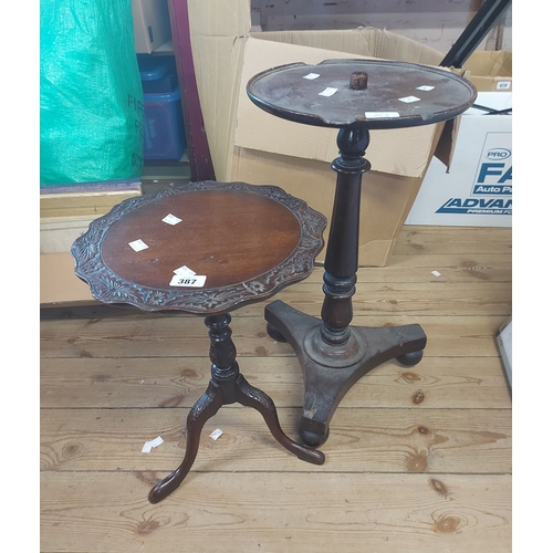 387 - Two 19th Century pedestal wine tables comprising one with rotating top and trefoil base, the other w... 