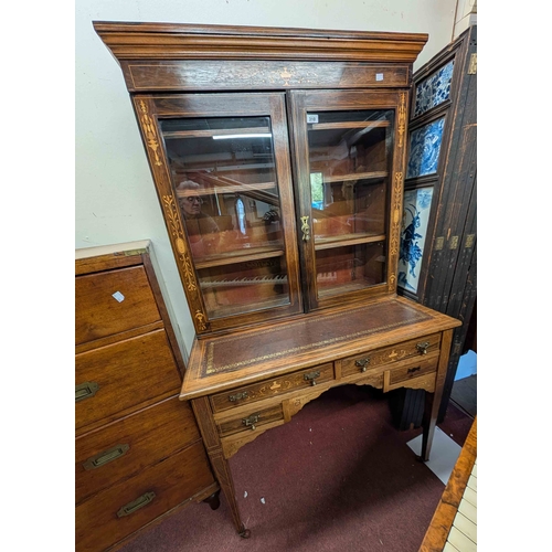 310 - A 91cm Edwardian inlaid rosewood and strung two-part bonheur-du-jeur desk with material lines shelve... 