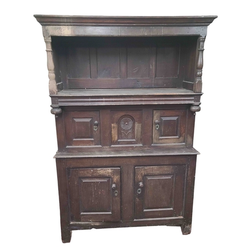 313 - A 1.35m antique Welsh oak tridarn, the open top section with moulded cornice, turned pillars and inc... 