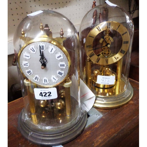Two anniversary clocks comprising a Koma under perspex dome and a ...