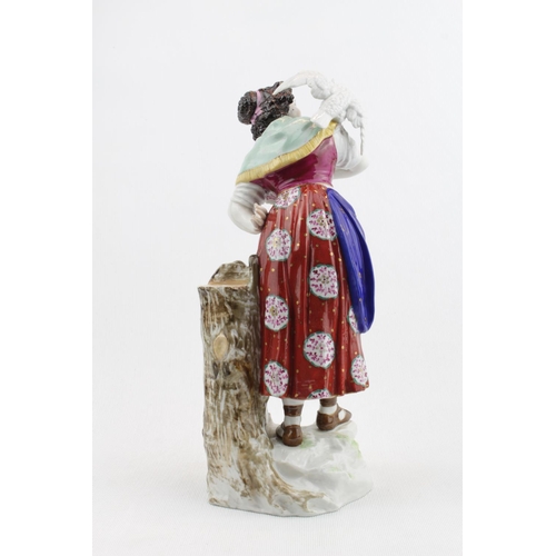 19 - 19thC German Hard Paste figure of a Woman with parrot on naturalistic setting, marked R 1762 in unde... 