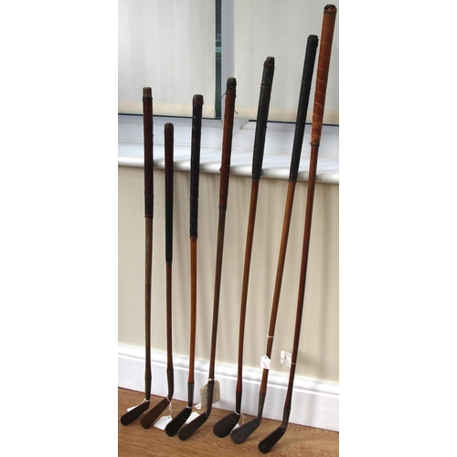 65 - Seven Hickory Shafted Golf Clubs to include Tom Stewart smooth faced cleek; Anderson of Anstruther (... 