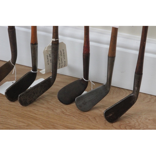 65 - Seven Hickory Shafted Golf Clubs to include Tom Stewart smooth faced cleek; Anderson of Anstruther (... 