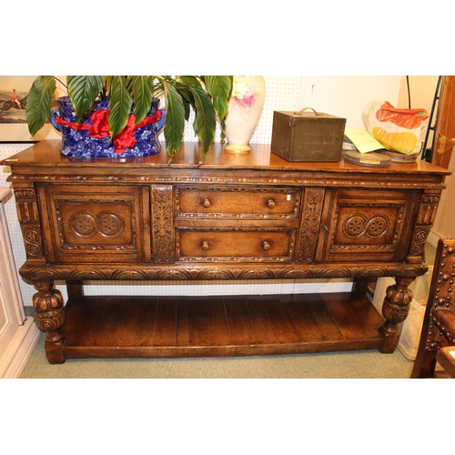 365 - Good Quality Oak Reproduction sideboard of two drawers flanked by 2 cupboards with applied detail ov... 