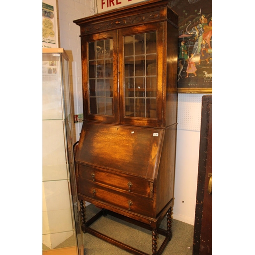 370 - 1920s Oak Bureau Bookcase with leaded glass top an Barley twist supports