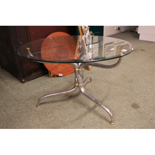 371 - Interesting small circular glass topped table on hammered white metal base with gilded ring decorati... 