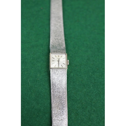 235 - Ladies 9ct White Gold Tissot ladies wristwatch