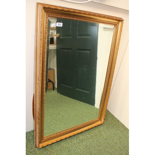 372 - Large Gilt framed bevel edge wall mirror