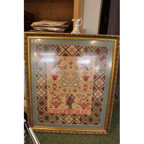 387 - Gilt framed Sampler by Gwen Moris undated