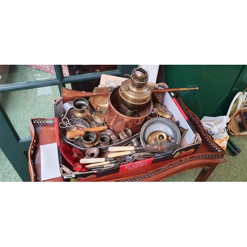 216 - Box of silver plate, copper and brass wares inc candle sticks and cutlery.