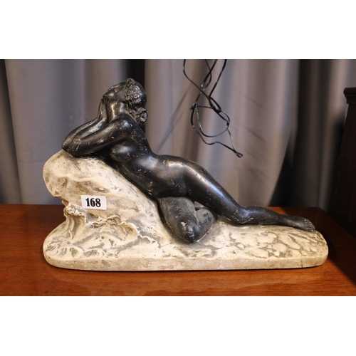 168 - A Large plaster sculpture of a reclining nude