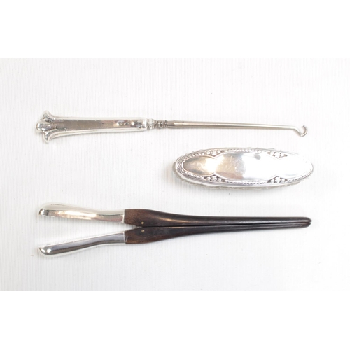 139 - Pair of Early 20thC Silver handled Glove stretchers, Button hook and a Silver Topped Oval glass pin ... 