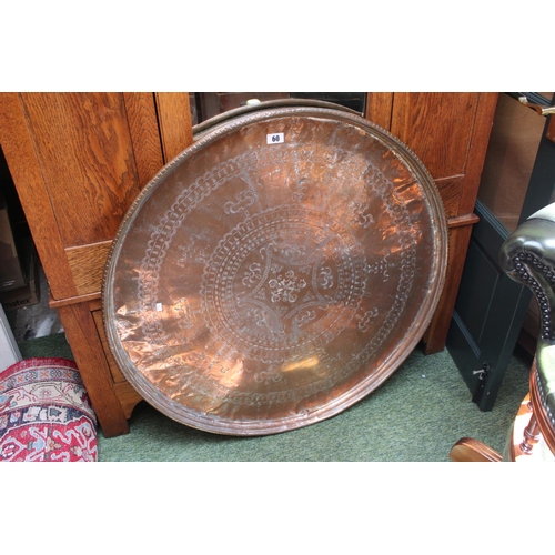 60 - Very Large 19thC Persian Copper Charger of engraved and impressed decoration 90cm in Diameter