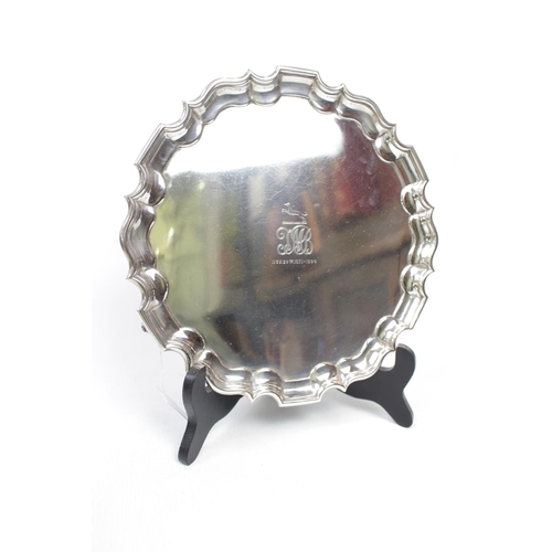 149 - Victorian Silver Salver with pie crust edge, with engraved Greyhound emblem to the Centre with intit... 