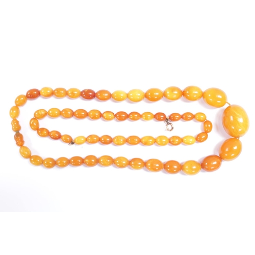 176 - Amber Graduated Necklace 49cm in Length and a Amber Bracelet 32cm in Length. 65g total weight