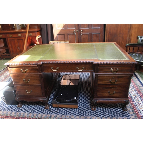 302 - Edwardian Mahogany breakfront Pedestal desk with green Leather inset top over brass drop handles and... 