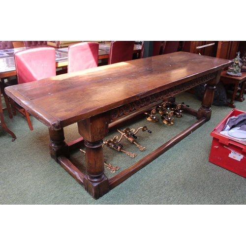 305 - 18thC Oak 2 Plank refectory table with peg joints over scroll carved support, turned supports and st... 