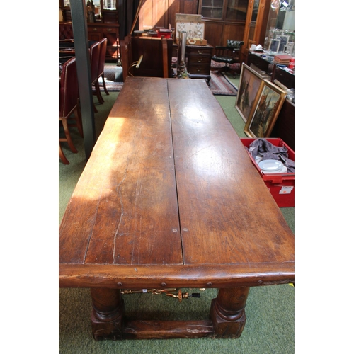 305 - 18thC Oak 2 Plank refectory table with peg joints over scroll carved support, turned supports and st... 