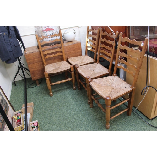 309 - Set of 4 Ladder back dining chairs with rush seats and turned supports