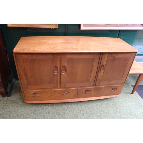 339 - Ercol 3 door 1960s blue label period light wood sideboard on casters in good condition