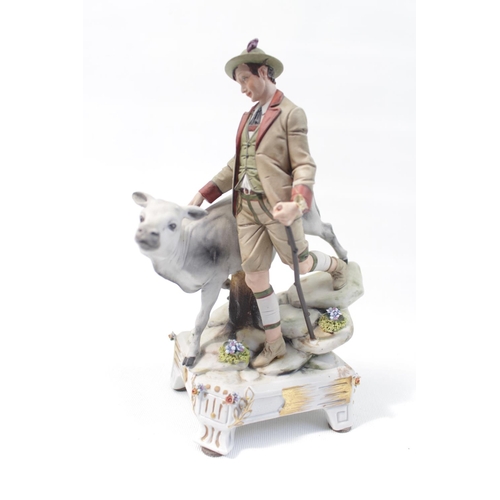 153 - Capodimonte figure of a Herder and Cow on naturalistic base with paperwork