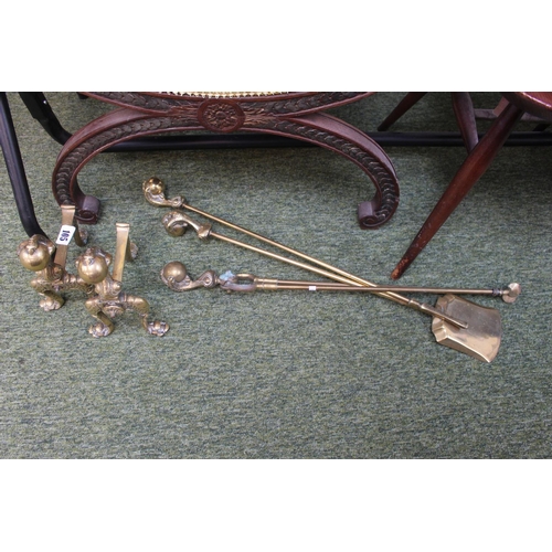 105 - Pair of Brass Fire Dogs and a 3 Piece Brass Companion Set