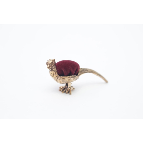 281 - Brass cased Pheasant Pin cushion