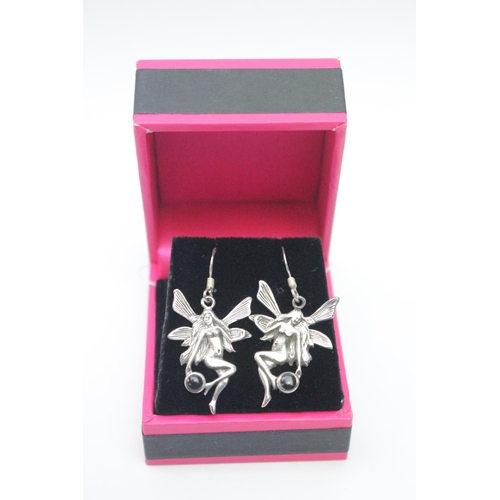 289 - Pair of Silver Fairy design earrings